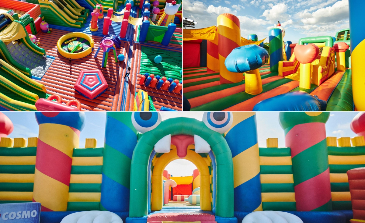 Bunte aufblasbare Spielgeräte mit Rutschen, Hindernissen und Torbogen in einem Fun Box Park